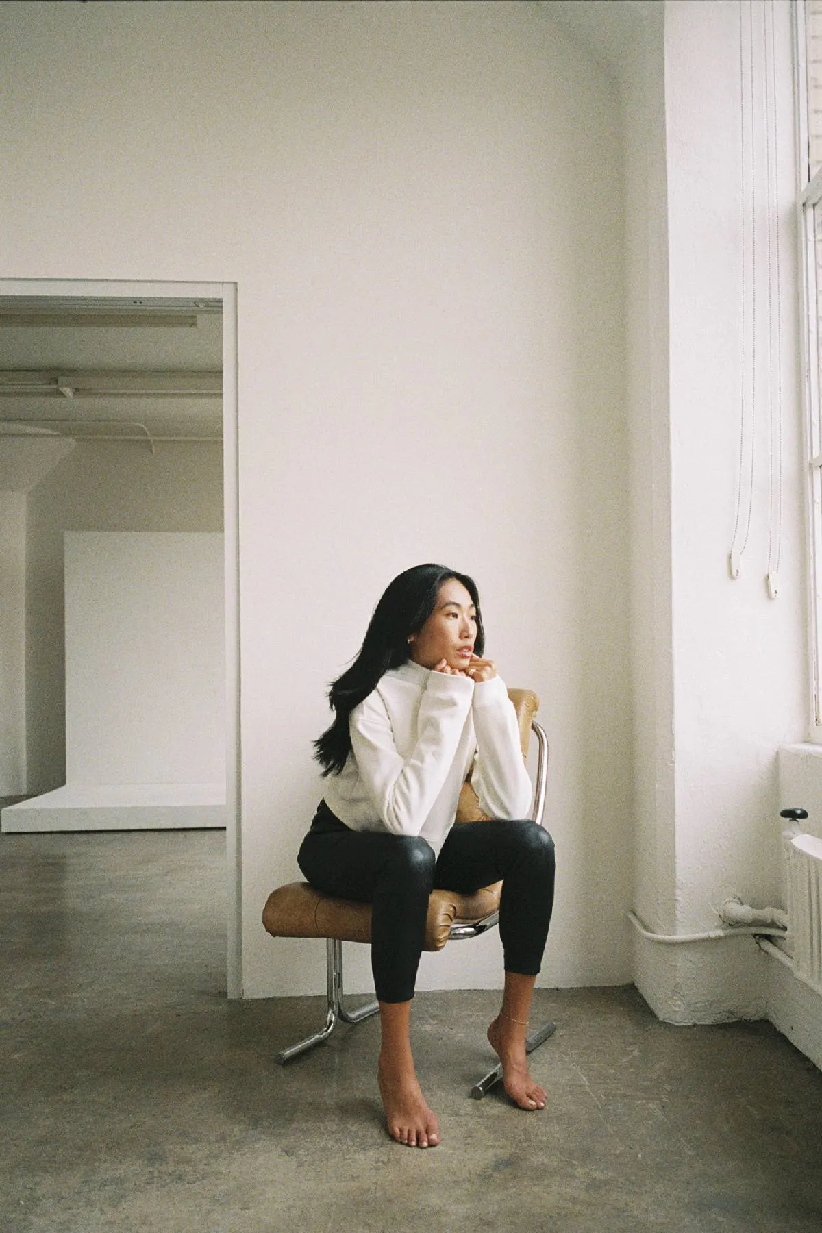 DSTLD Women's Mock Neck in Off White sold by Bailey 44