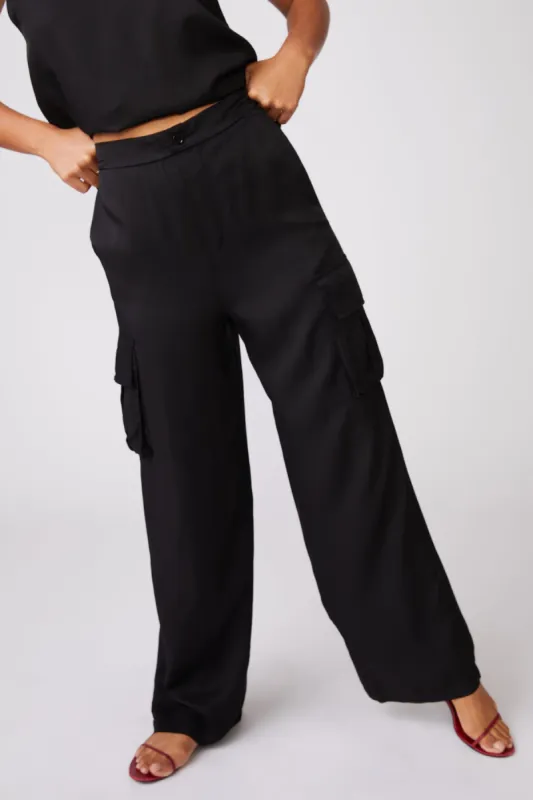 Stateside Viscose Satin Cargo Pant in Black sold by Bailey 44