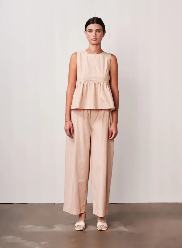 Fine Poplin Peplum in Almond sold by Bailey 44