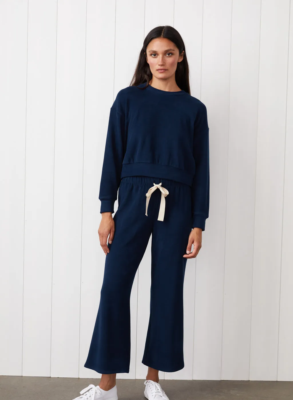 Honeyluxe Tie Hem Pullover in New Navy sold by Bailey 44