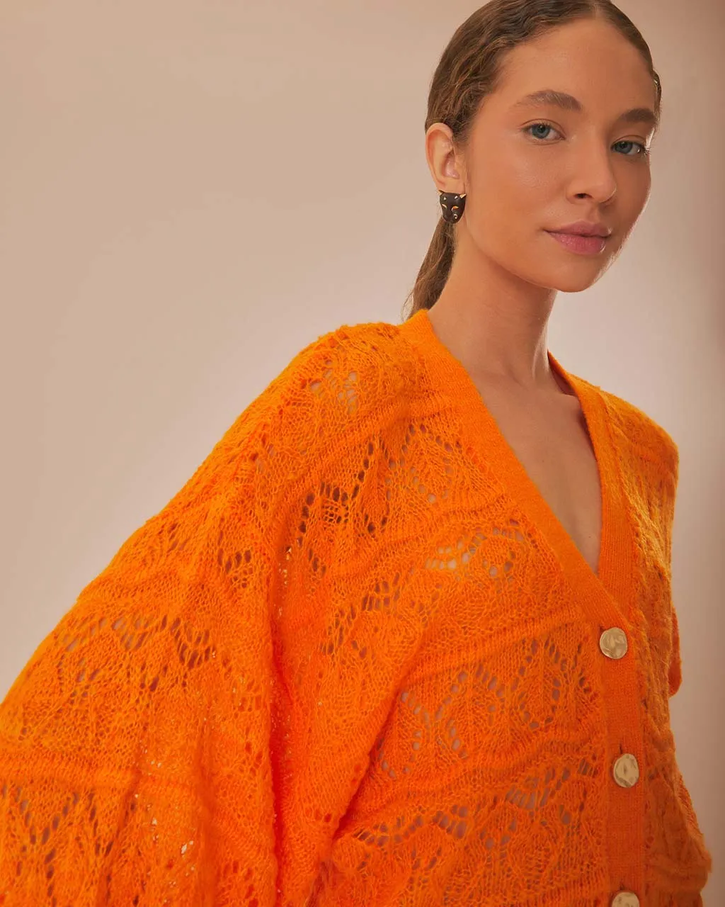 Orange Textured Knit Cardigan sold by ban.do