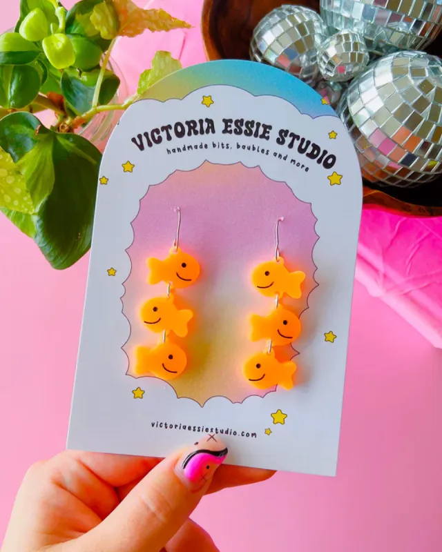Goldfish Earrings sold by ban.do
