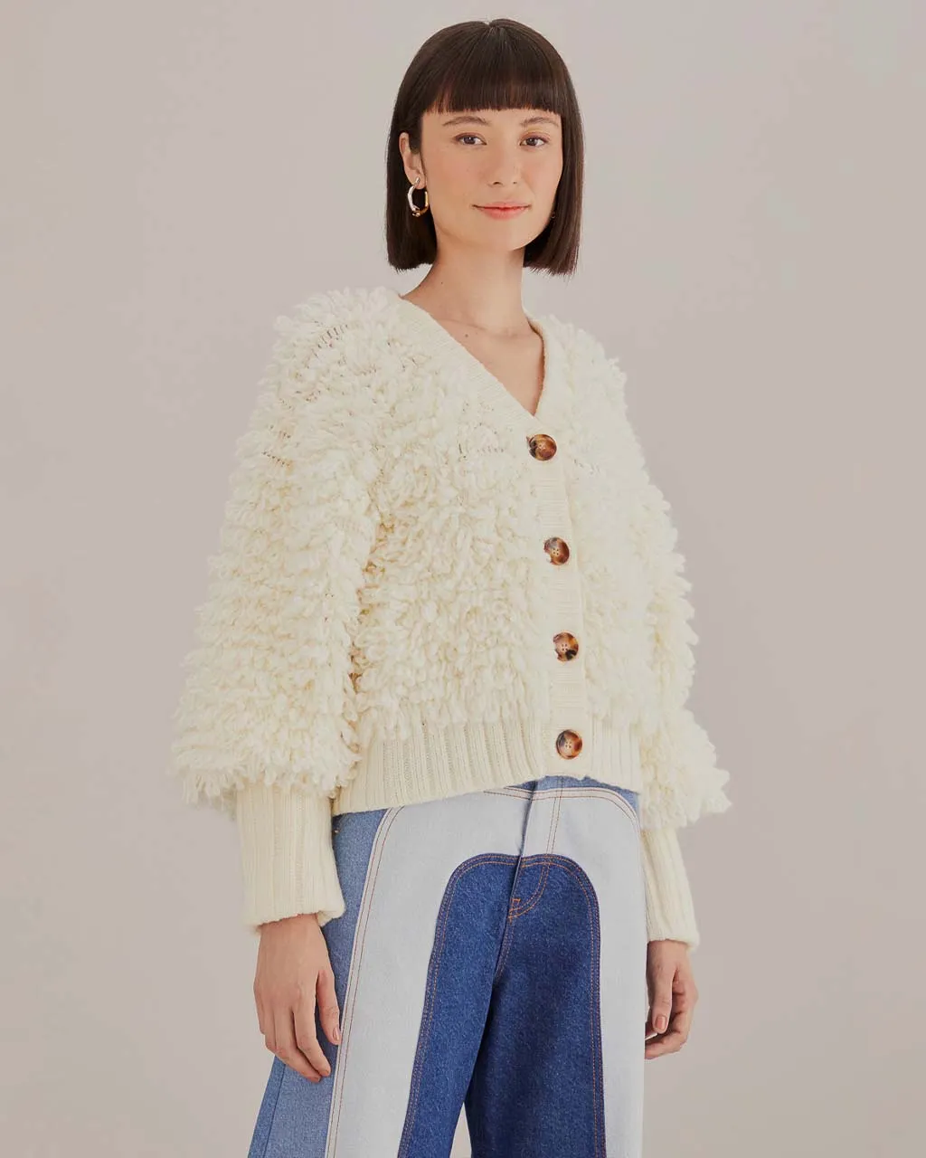 Off-White Textured V-Neck Cardigan sold by ban.do