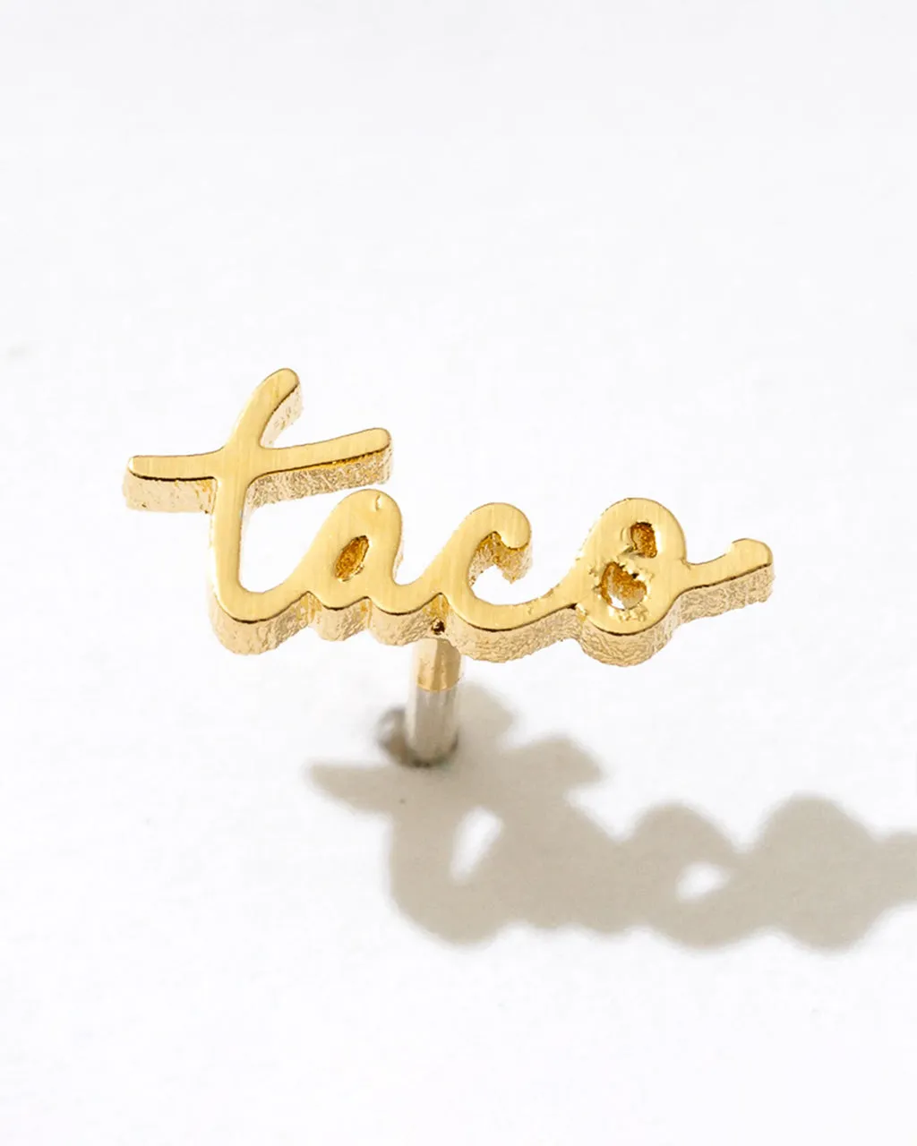 Taco 14K Gold Plated Word Stud Earring - Single sold by ban.do