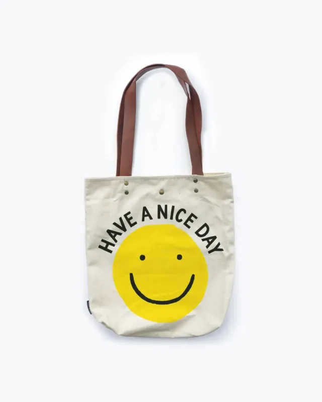 Smiley Tote sold by ban.do