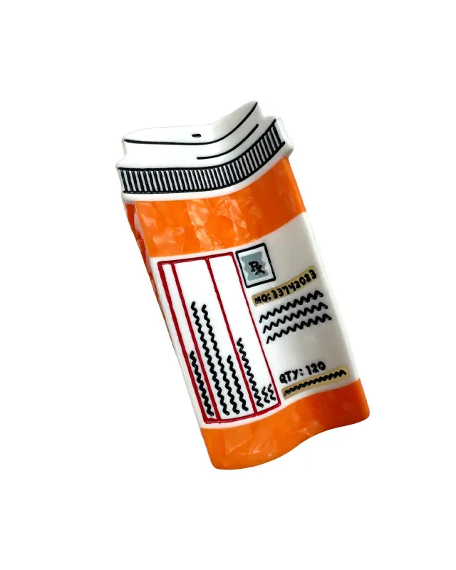 Prescription Bottle Hair Claw sold by ban.do