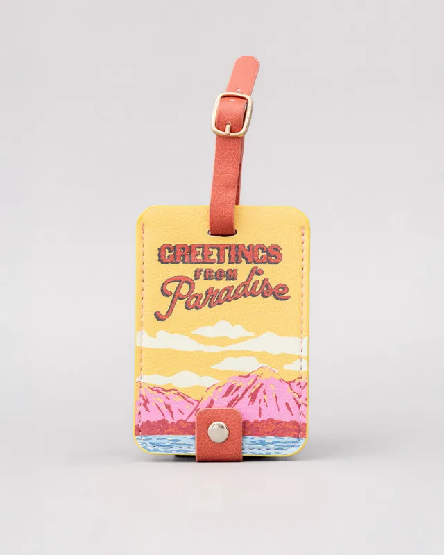 Getaway Luggage Tag - Greetings from Paradise sold by ban.do