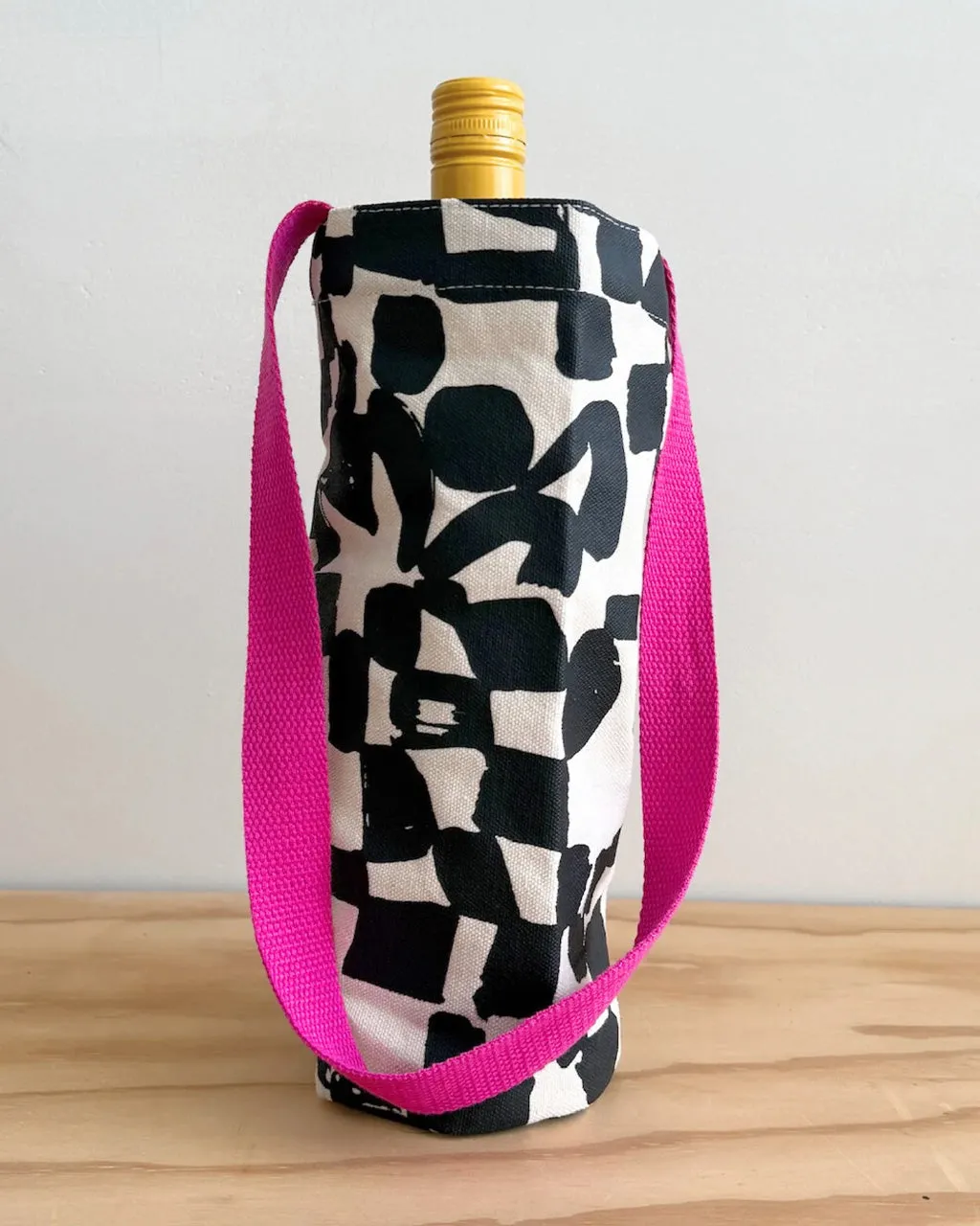 The Checks Wine Tote - Black + Natural sold by ban.do