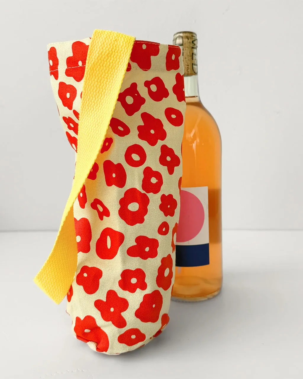 The Celeste Wine Tote - Poppy + Sunshine sold by ban.do