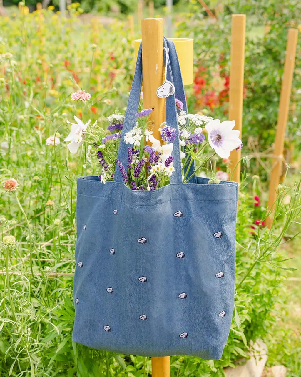 Snoopy Embroidered Denim Tote Bag sold by ban.do