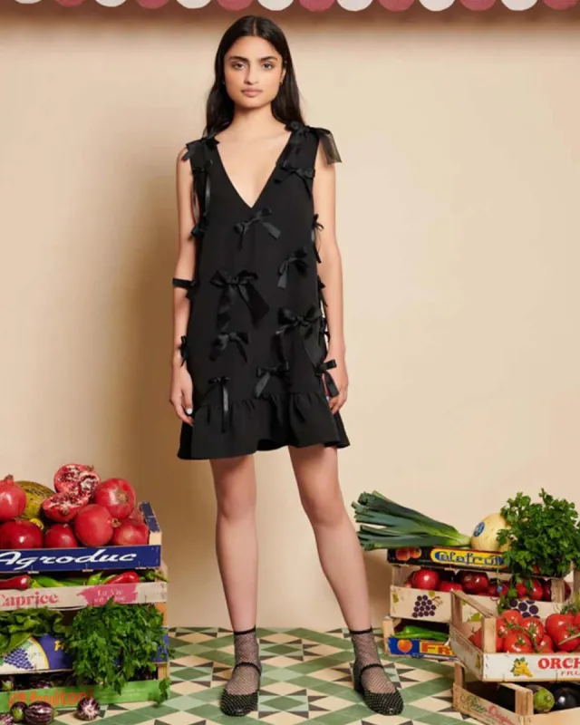Butter Bow Mini Dress sold by ban.do