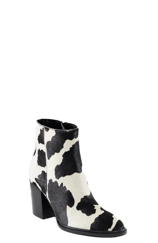 Shasta 2 Black and White Cowprint Bootie sold by Band of Gypsies