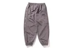 COLOR CAMO DEFORMATION LOOSE FIT TRACK PANTS sold by Bape