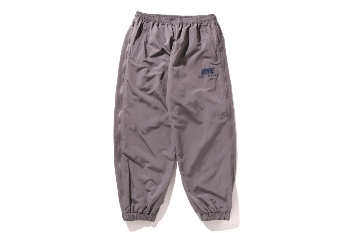 COLOR CAMO DEFORMATION LOOSE FIT TRACK PANTS sold by Bape