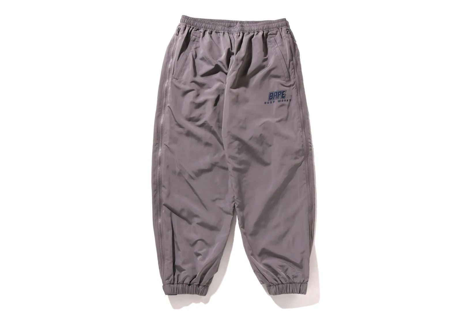 COLOR CAMO DEFORMATION LOOSE FIT TRACK PANTS sold by Bape