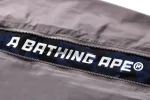 COLOR CAMO DEFORMATION LOOSE FIT TRACK PANTS sold by Bape