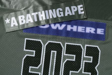 BAPE FOOTBALL JERSEY sold by Bape