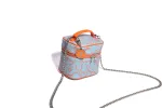 NEON CAMO VANITY BAG sold by Bape