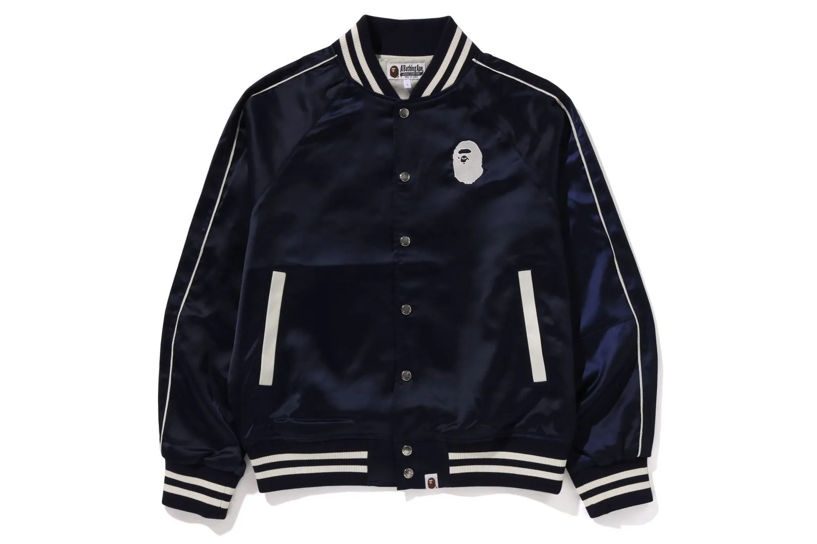A BATHING APE NYLON VARSITY JACKET sold by Bape
