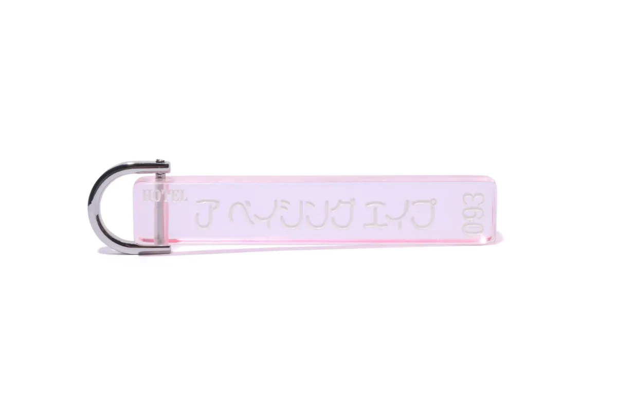 A BATHING APE HOTEL KEYCHAIN sold by Bape