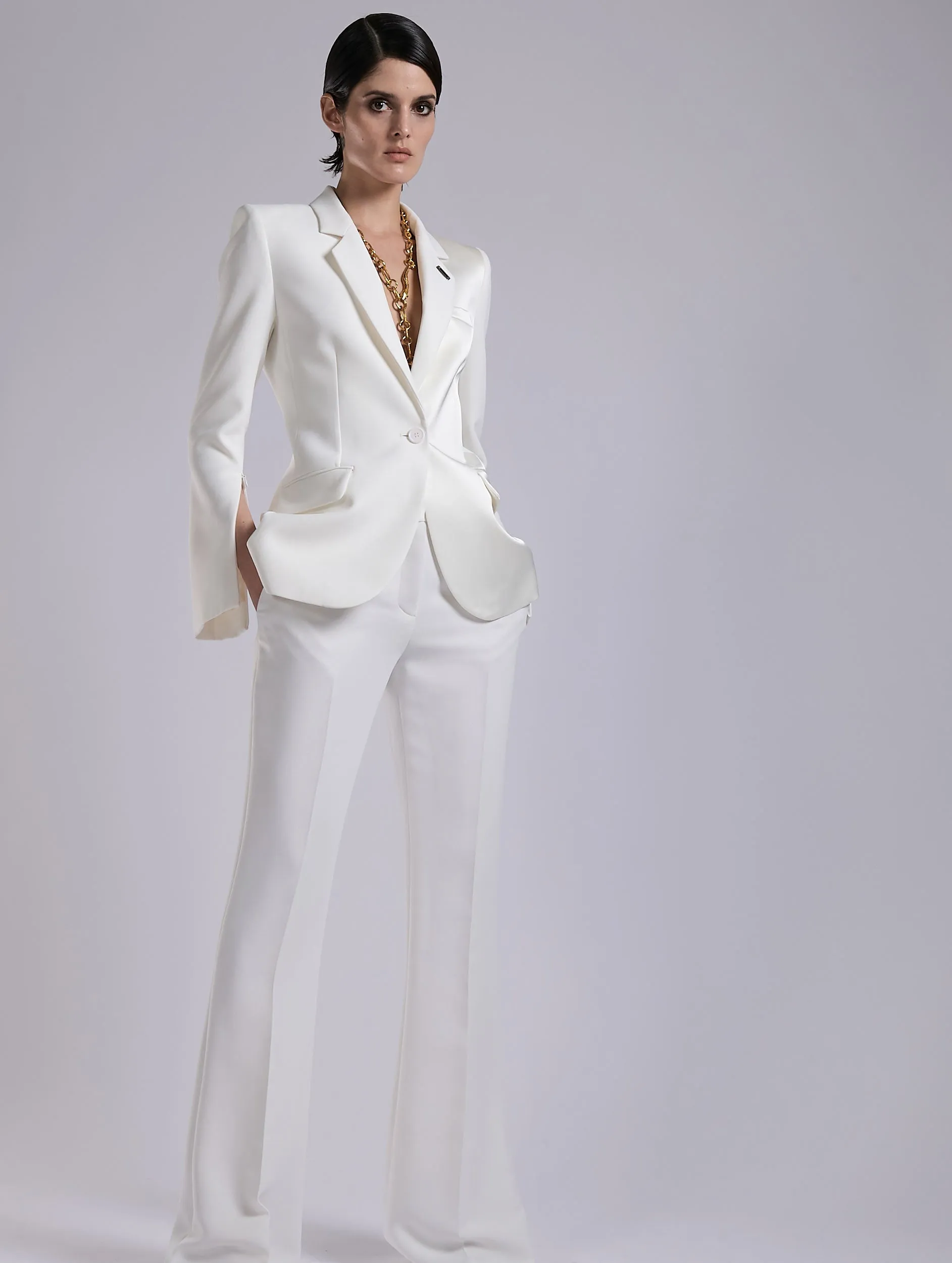 Veste à manches zippées en crêpe et satin ivoire sold by Barbara Bui