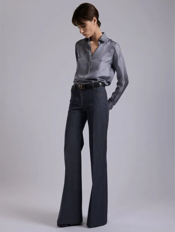 Pantalon flare en denim de laine bleu sold by Barbara Bui