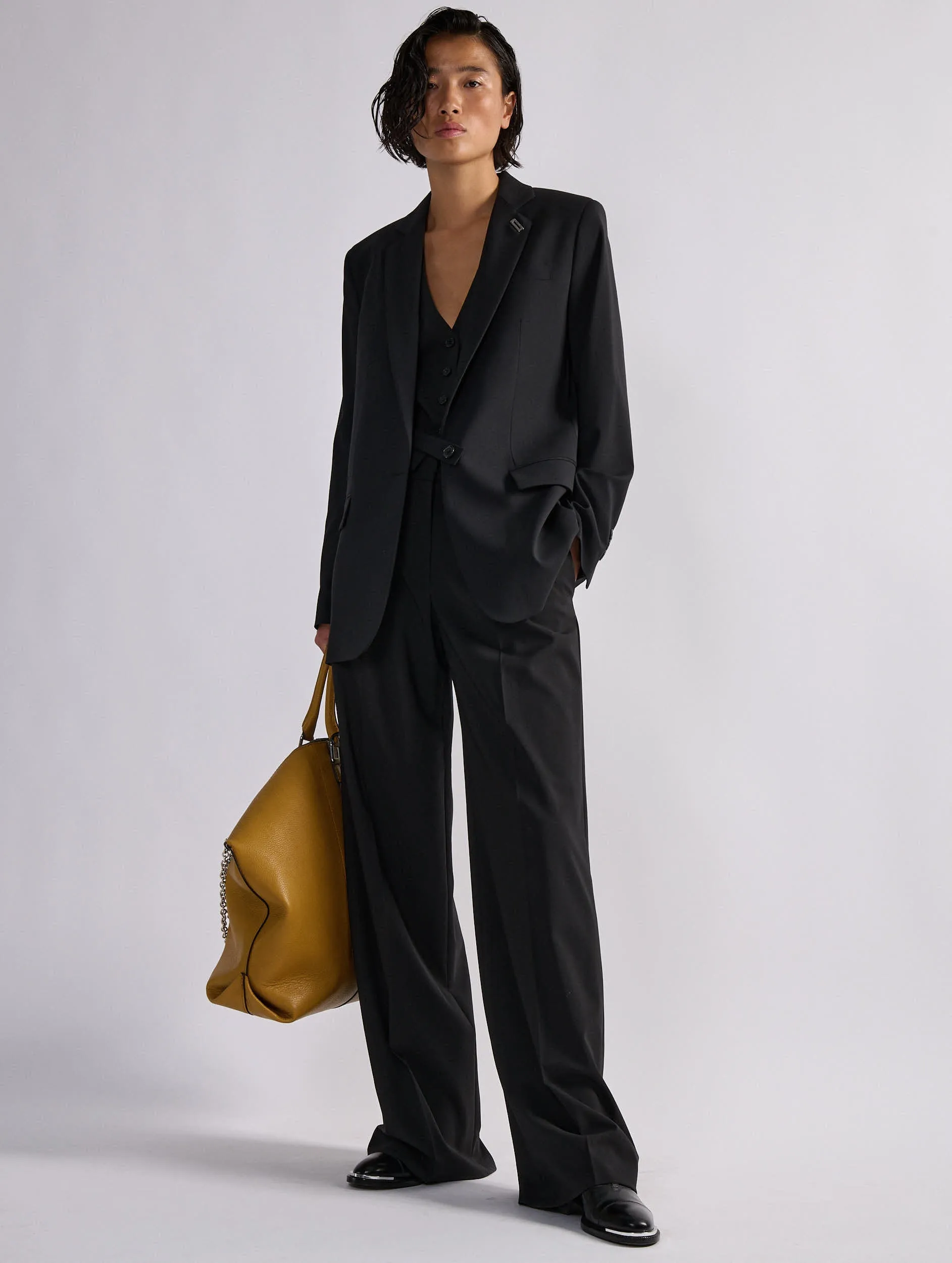 Veste droite en toile de laine noire sold by Barbara Bui