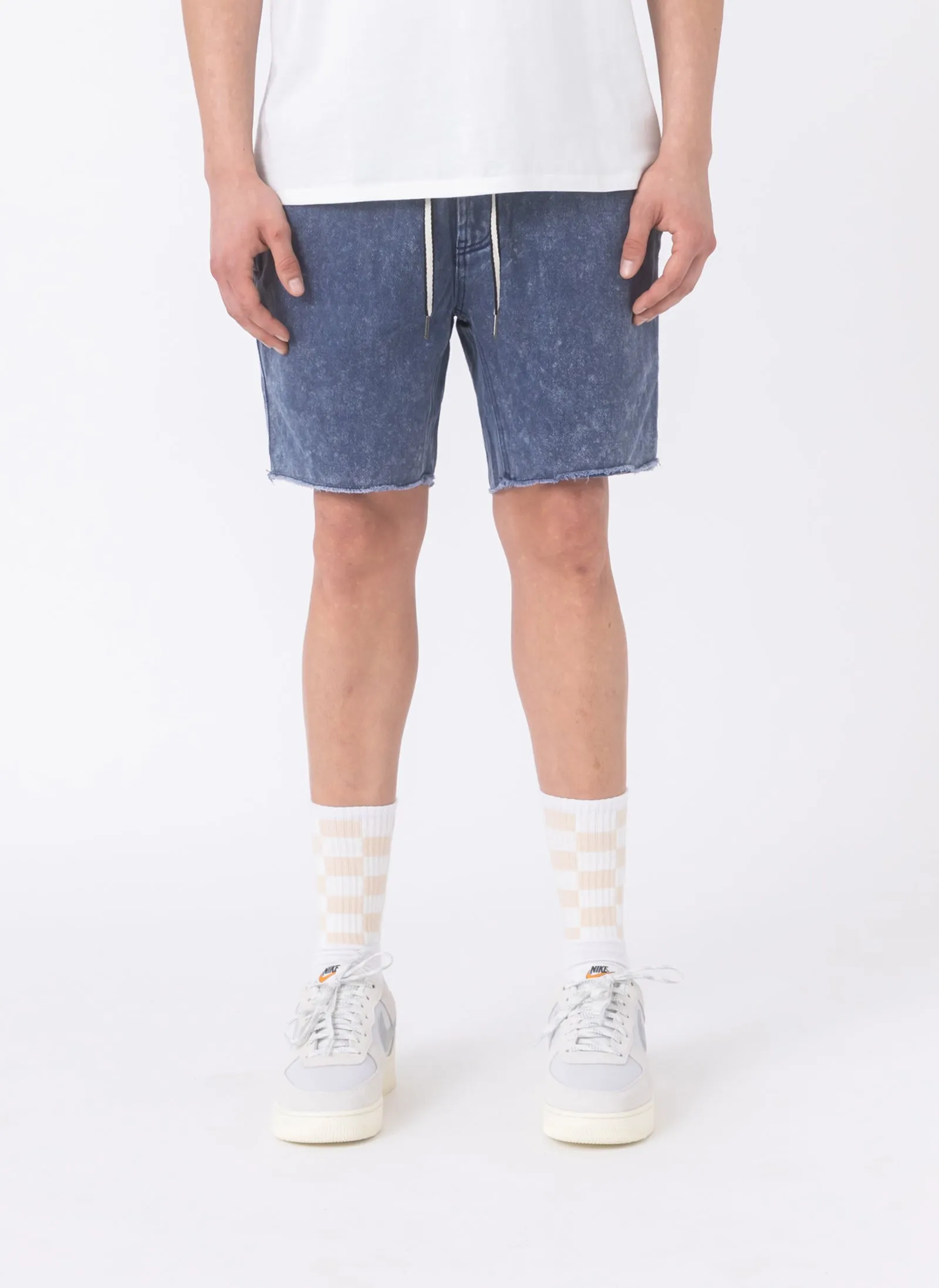 B.Relaxed Short Navy Acid sold by Barney Cools