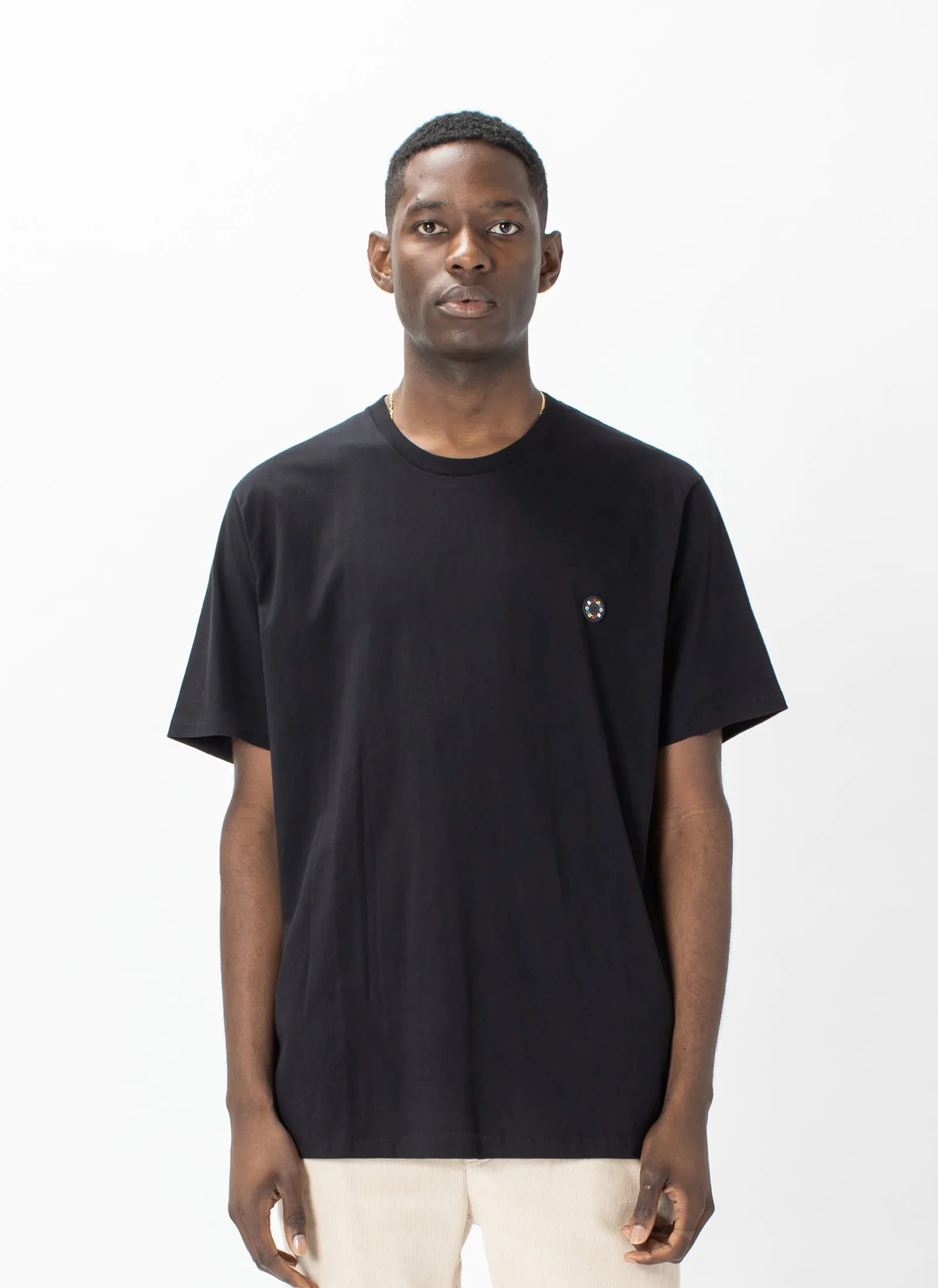 Badge Tee Black sold by Barney Cools