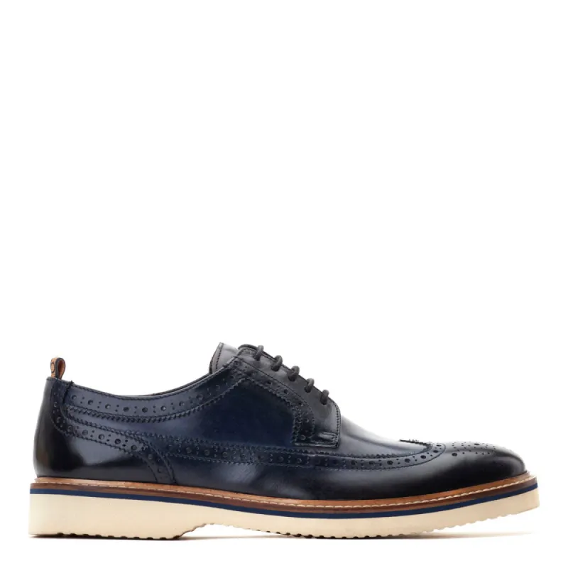 Sully Washed Brogue Shoes Navy sold by Base London