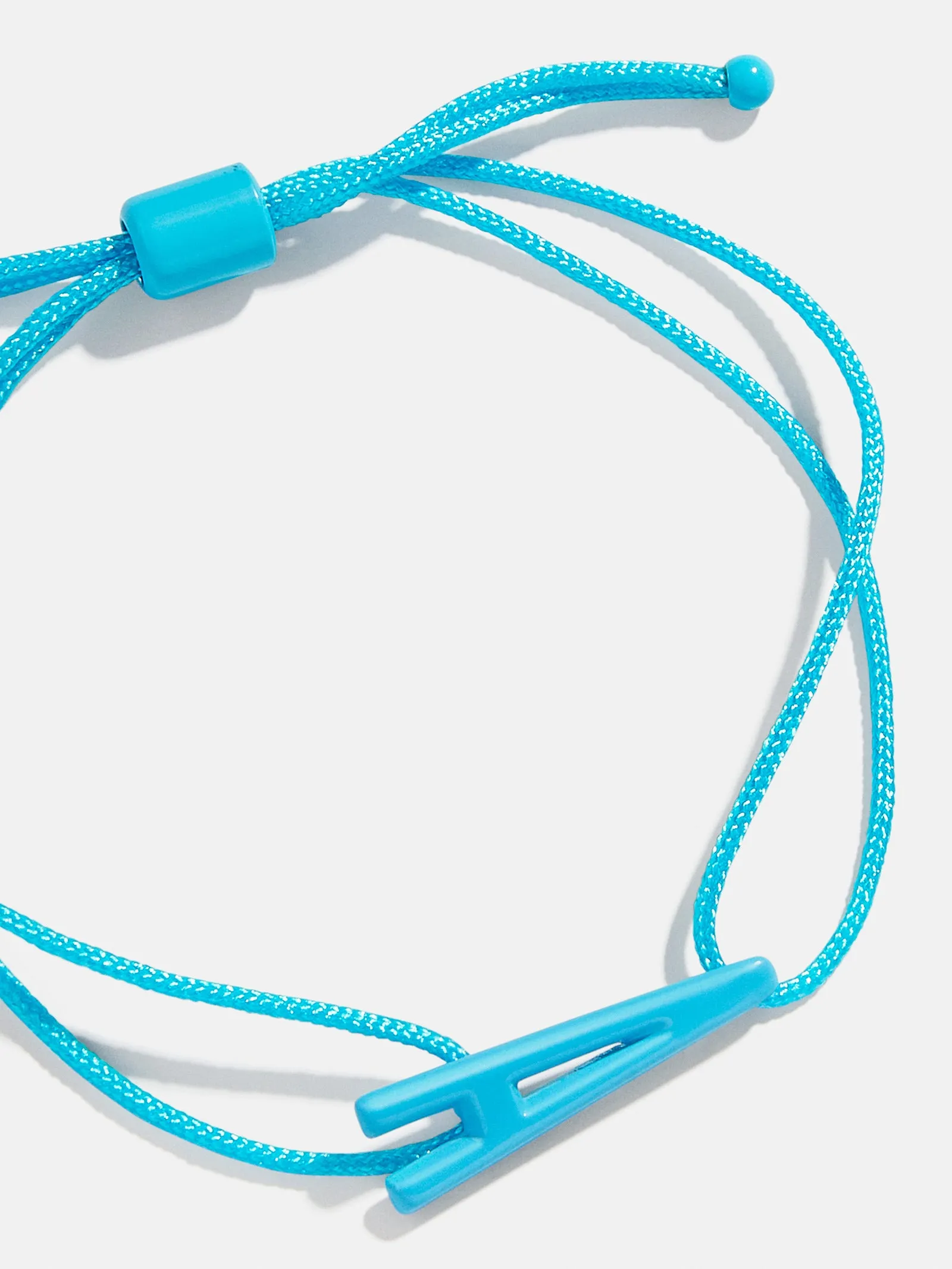 East West Initial Cord Bracelet - Aqua sold by BaubleBar