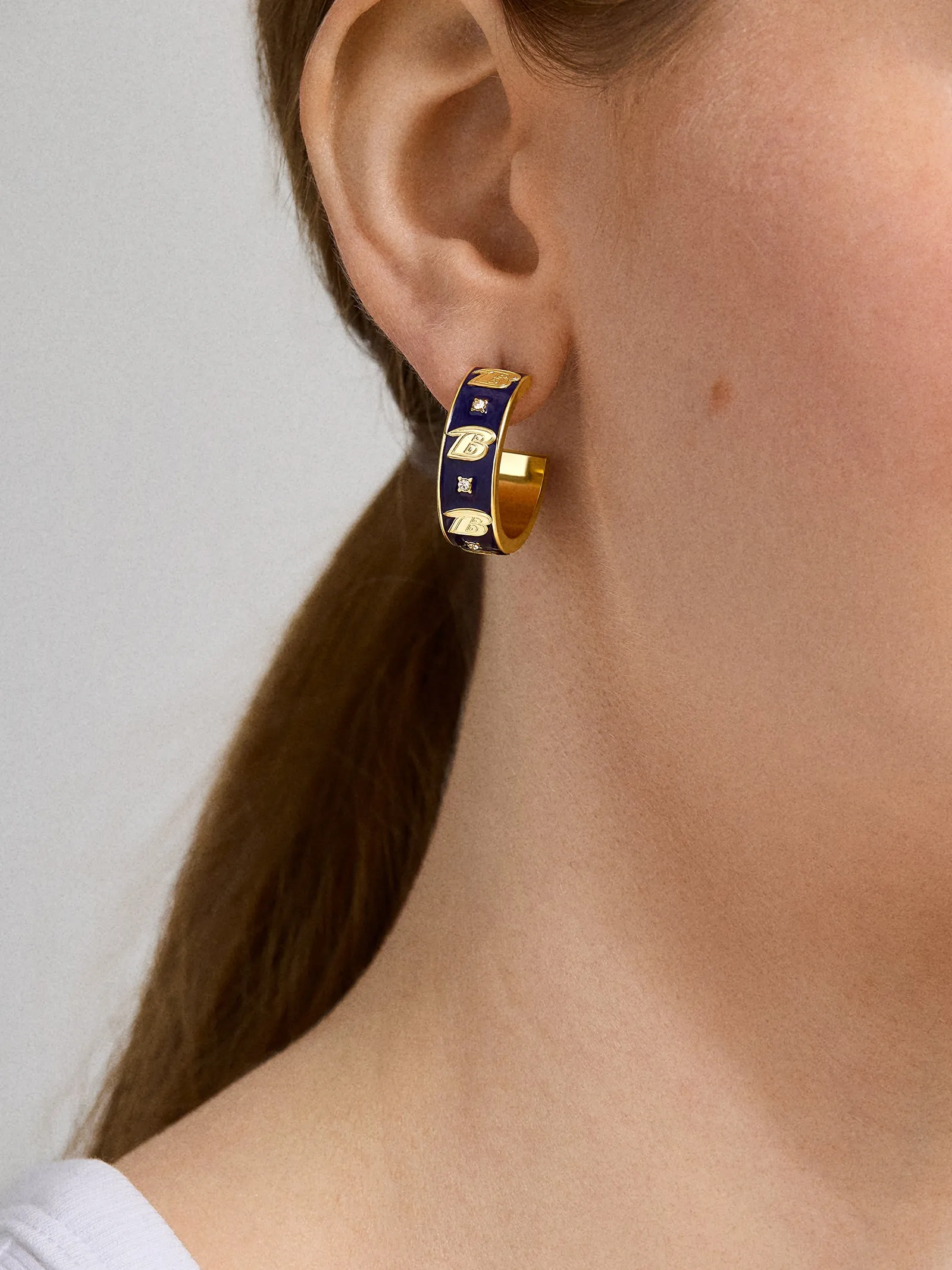 WEAR By Erin Andrews x BaubleBar Enamel Hoop Earrings - Baltimore Ravens sold by BaubleBar product image thumbnail 2