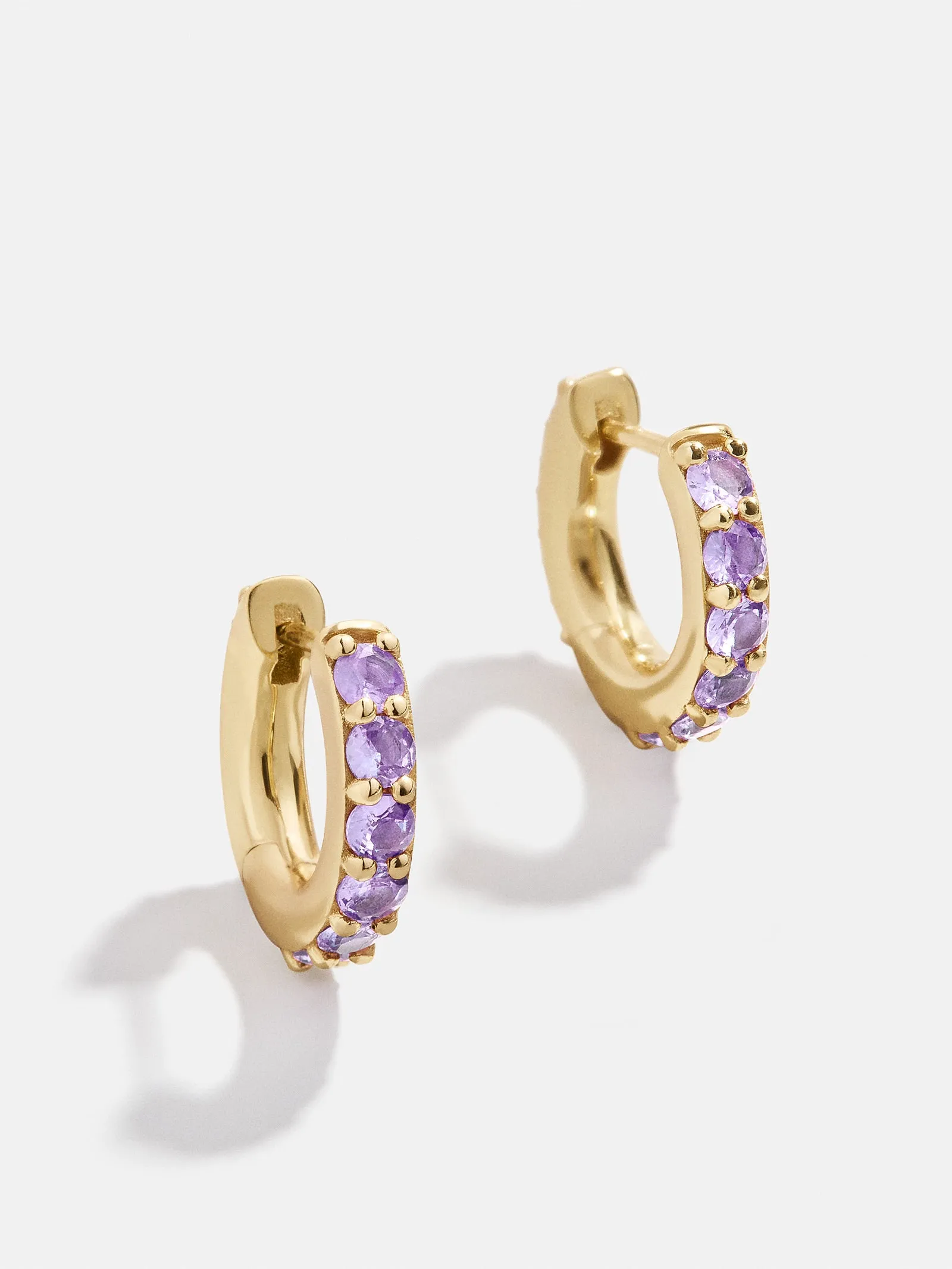 18K Gold Birthstone Huggie Earrings - Light Amethyst sold by BaubleBar