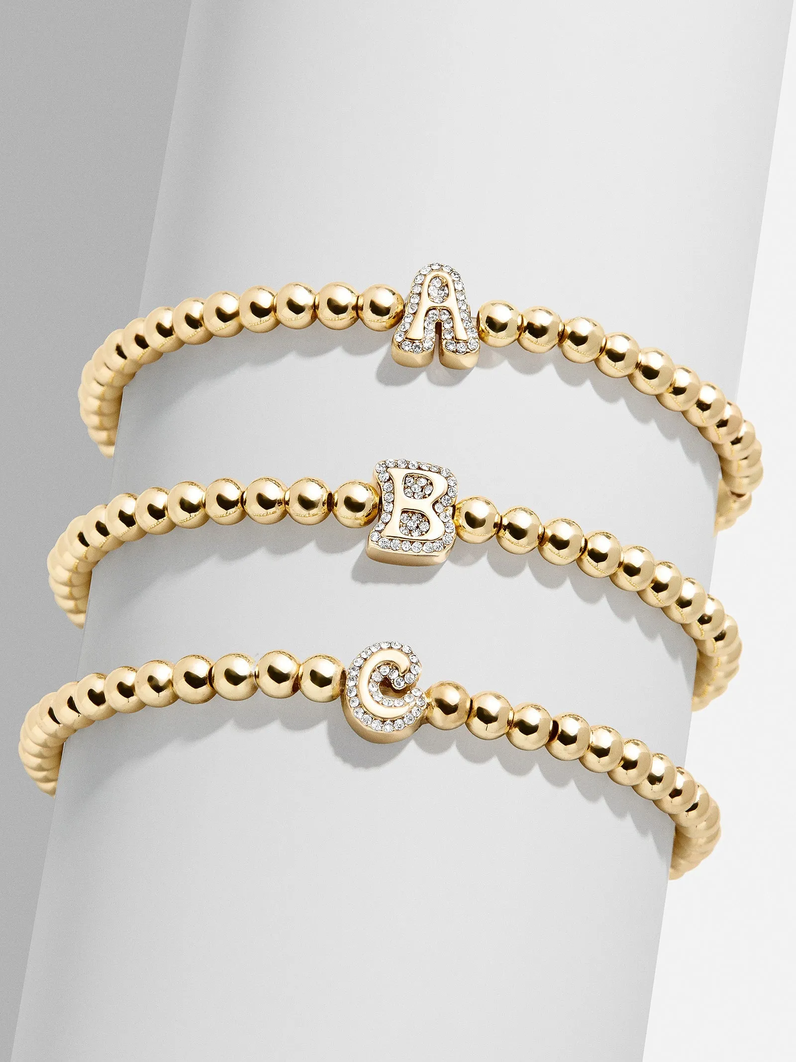 Initial Pisa Bracelet - Clear/Gold sold by BaubleBar