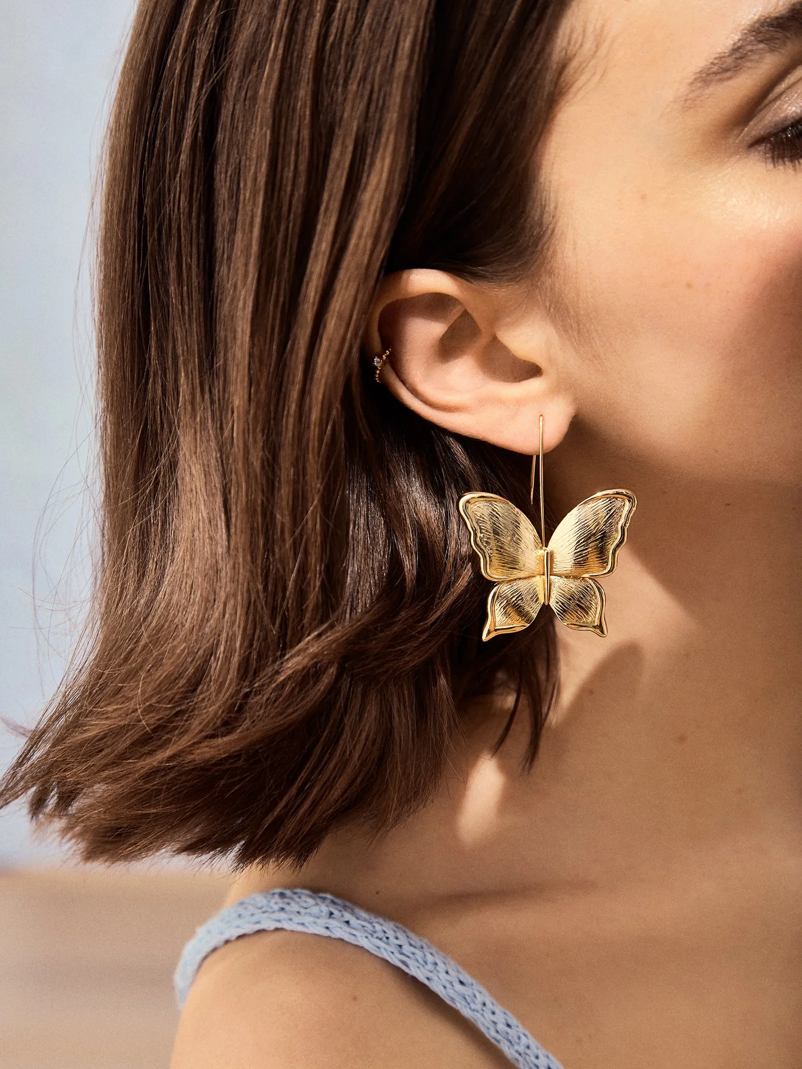 Flutter Away Earrings - Gold sold by BaubleBar product image thumbnail 2