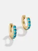 18K Gold Birthstone Huggie Earrings - Blue Zircon sold by BaubleBar