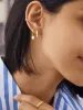 18K Gold Semi-Precious Huggie Earrings - Opal sold by BaubleBar