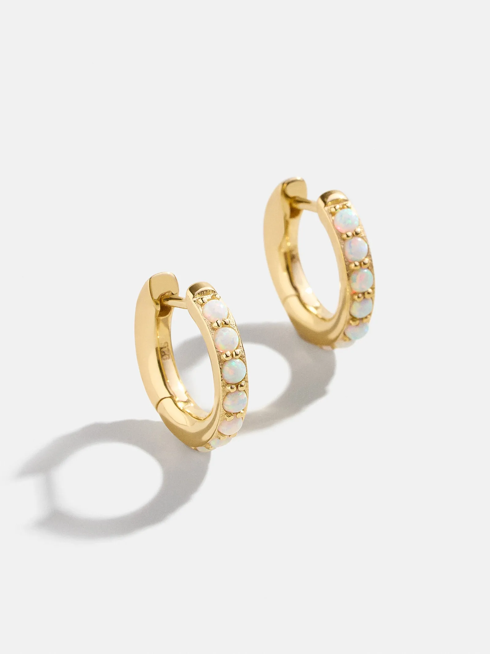18K Gold Semi-Precious Huggie Earrings - Opal sold by BaubleBar