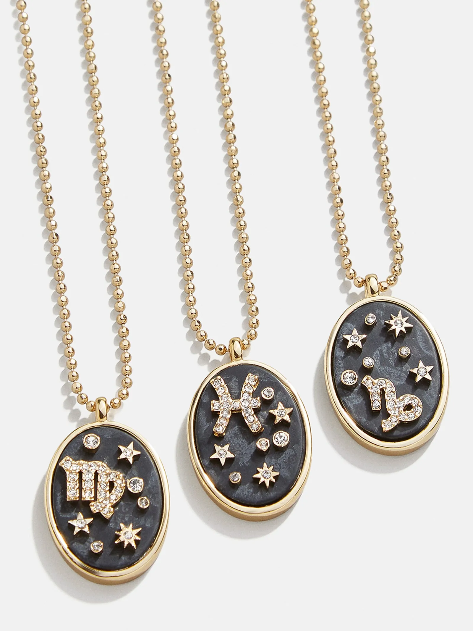 Zodiac Sign Pendant Necklace sold by BaubleBar