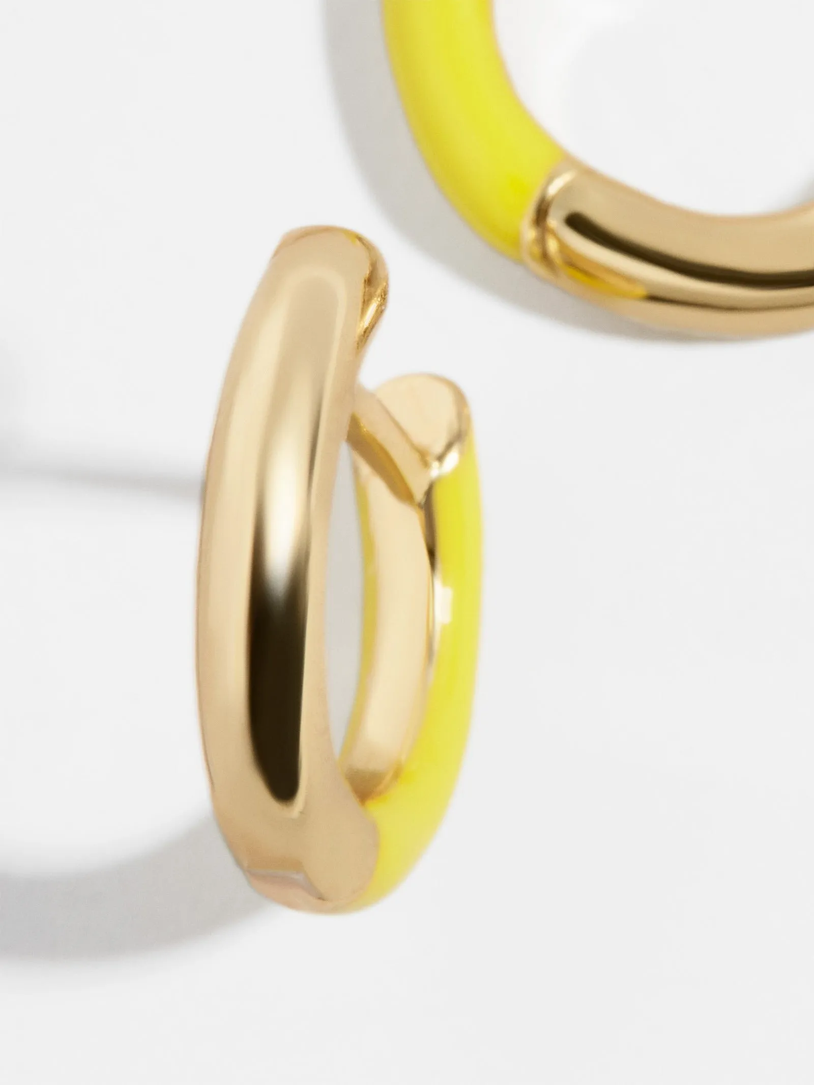 Sage 18K Gold Huggie Earrings sold by BaubleBar product image thumbnail 3