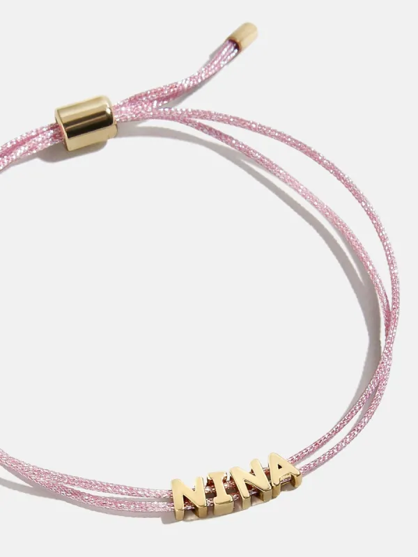 Custom Cord Bracelet - Metallic Pink sold by BaubleBar