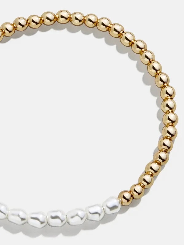 Pippa Pisa Bracelet - Gold/Pearl sold by BaubleBar