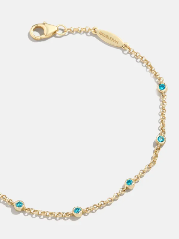 Yasmine 18K Gold Birthstone Bracelet - Blue Zircon sold by BaubleBar