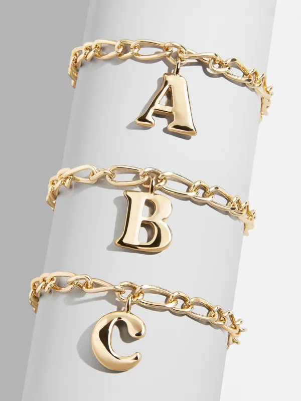Chunky Charm Initial Bracelet - Gold sold by BaubleBar