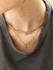 18K Gold Motif Necklace - Hamsa sold by BaubleBar