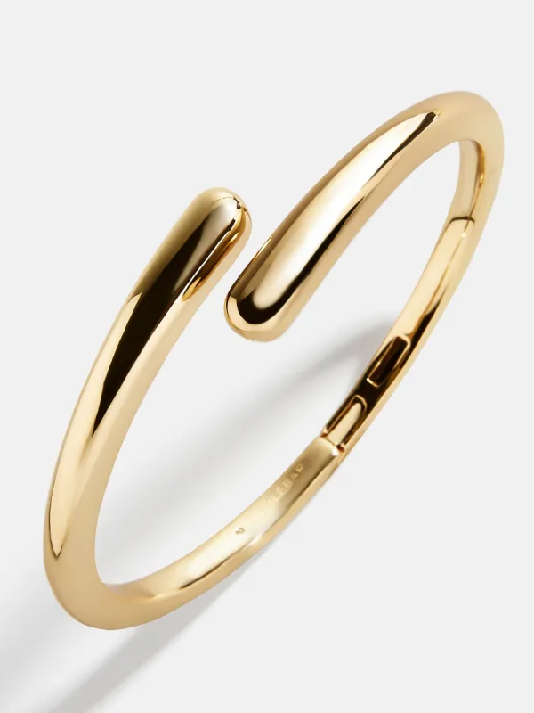 Naomi Wrap Hinge Bangle - Gold sold by BaubleBar