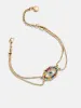 Evil Eye Reversible Bracelet - Gold/Multi sold by BaubleBar