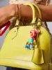 Mickey Mouse disney Bag Charm - Glow In The Dark Multi Colorblock sold by BaubleBar