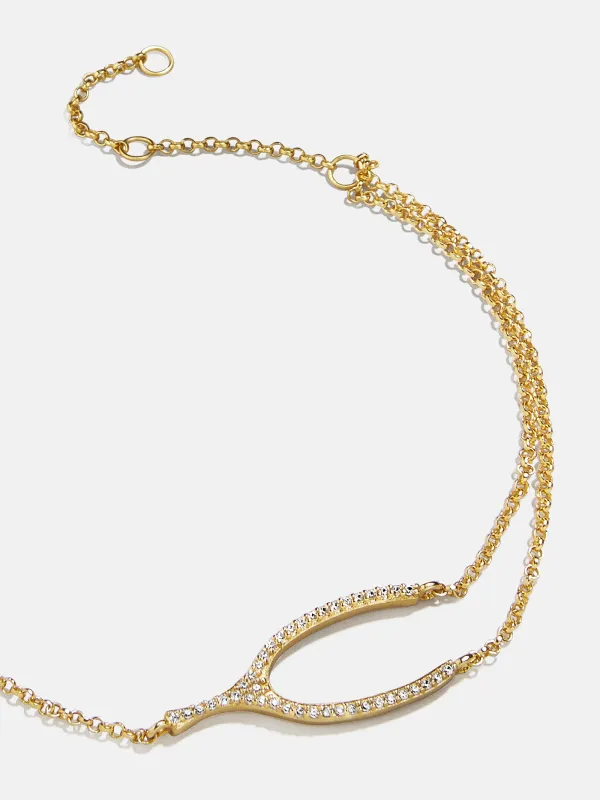 Sabrina 18K Gold Motif Bracelet - Wishbone sold by BaubleBar
