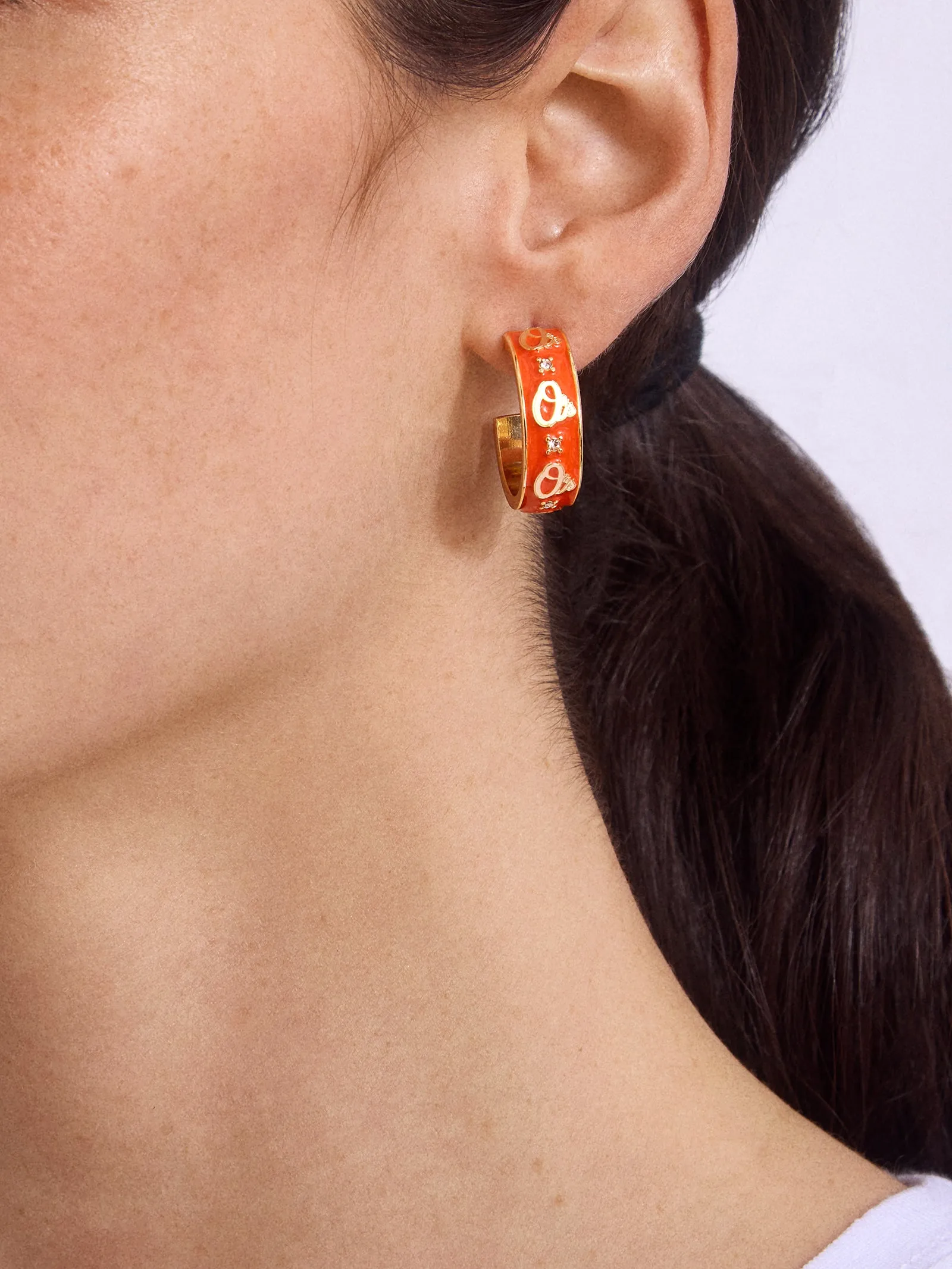 WEAR By Erin Andrews X BaubleBar Baltimore Orioles Enamel Hoop Earrings - Baltimore Orioles sold by BaubleBar product image thumbnail 2